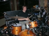 Dan Needham on drums recording \"All Over The World\"